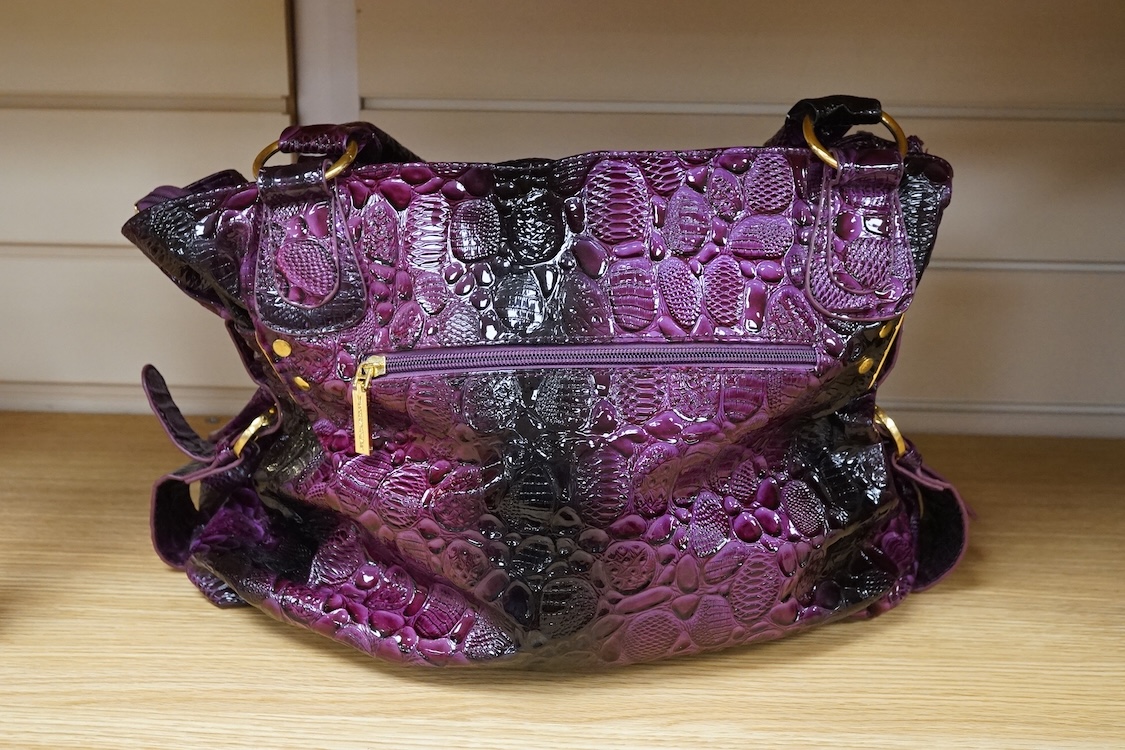 A purple patent Versace large handbag, approximately 41cm wide